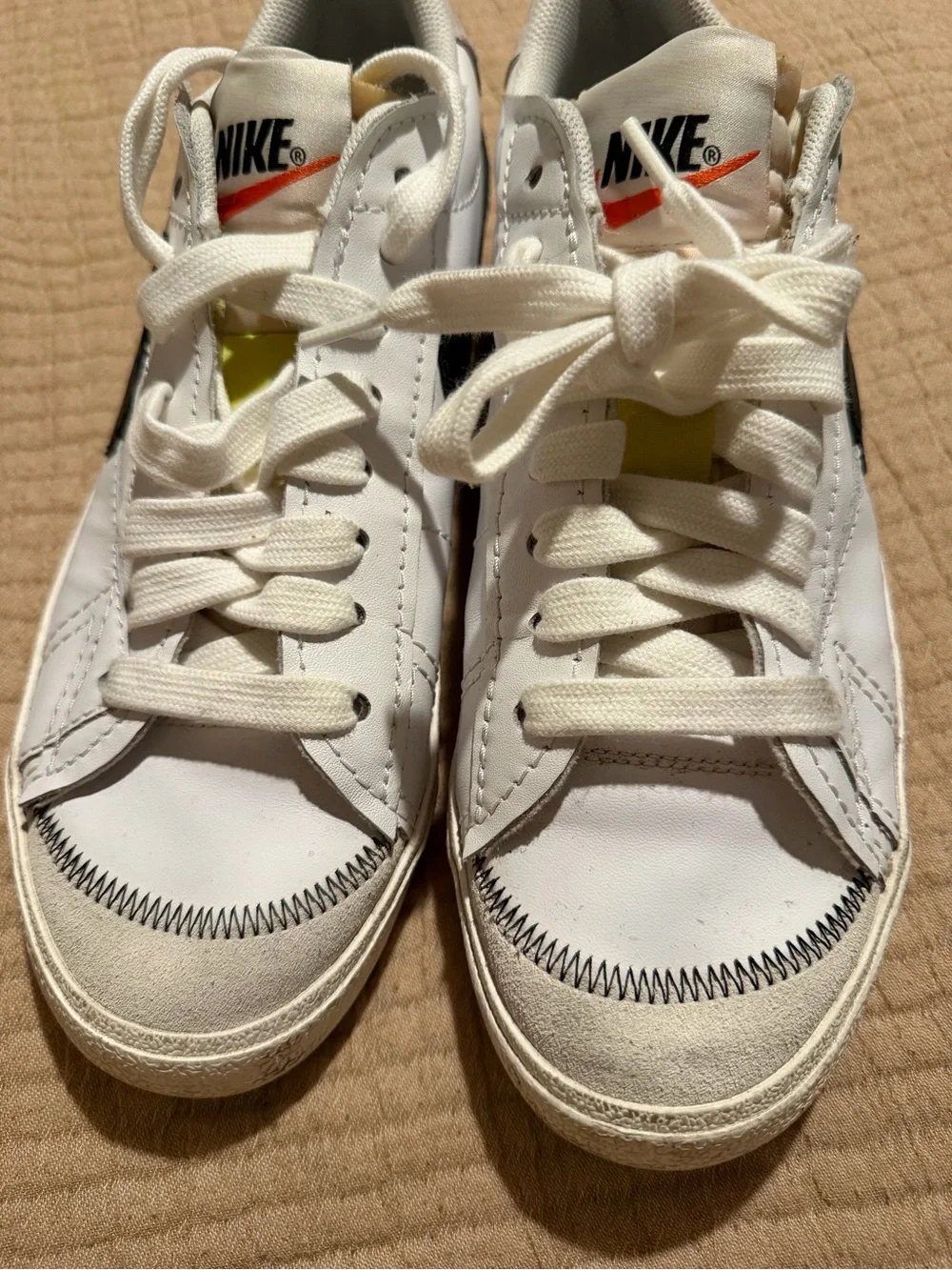 Nike Kids White Sneakers with Black Swoosh